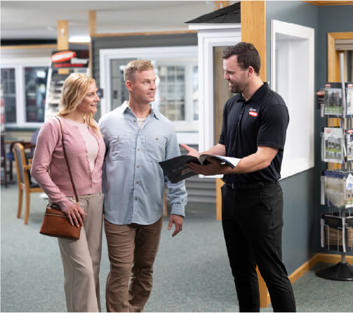 Couple walking through Comfort showroom